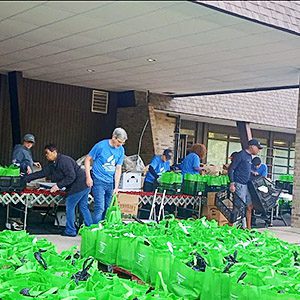 overseeing food bag distribution